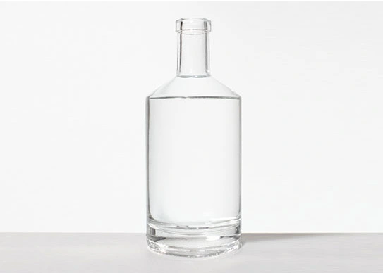 hot sale 700ml glass bottle heavy base round shape plate finish 1